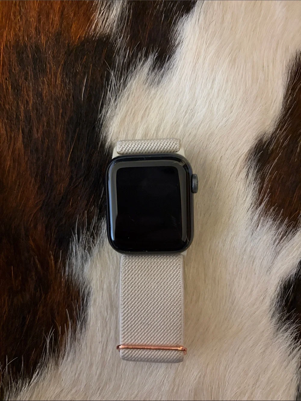 Apple Watch Series 5 with Black Case and Cream Woven Band